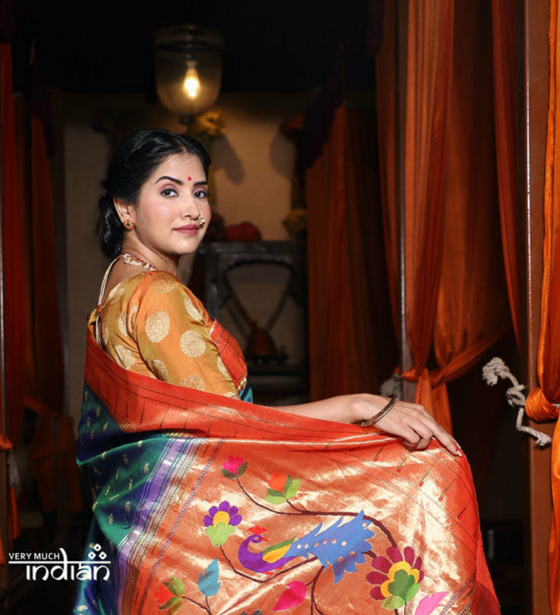 Authentic Handloom Pure Silk Muniya Border Paithani with Exclusive Pallu and Buttis - Dual Tone Blue Green