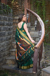 Rang Mahal ~ Handloom Pure Silk Paithani Maharani Paithani in Royal Green with Nath Buttis (With Silk Mark)