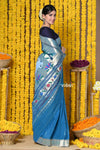Rajsi~ Handloom Pure Cotton Muniya Border Saree WIth Handcrafted Pichwai Pallu in Cerulean Blue