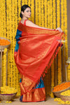 Rajsi~ Handloom Pure Silk Gadwal Saree Handcrafted Zari Pallu In Blue and Orange Border