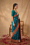 Ganga Ghat ~ Banarasi Pure Katan Silk Saree with Contrast Red Border In Teal Blue
