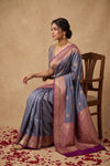 Ganga Ghat ~ Banarasi Pure Katan Silk Saree with Contrast Purple Border In Greyish Blue