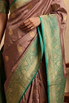 Ganga Ghat ~ Banarasi Pure Katan Silk Saree with Contrast Sea Green Border In Mauve