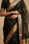 Ganga Ghat ~ Banarasi Pure Tissue Silk Saree In Black With with Rich Lachha Border