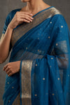 Ganga Ghat ~ Banarasi Pure Tissue Silk Saree In Turquoise Blue With with Rich Lachha Border