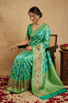 Ganga Ghat ~ Banarasi Handloom Khaddi Georgette Saree In Sea Green