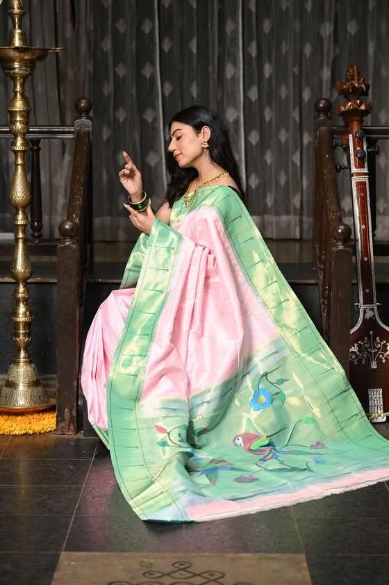 Mahalakshmi ~ Handloom Pure Silk Pink Muniya Border Saree With Handcrafted Parrot Pallu in Powder Pink and Green