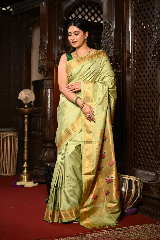 Mahalakshmi ~ Handloom Pure Silk Paithani with Swan Pallu with Muniya Buttis in Sage Green