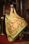 Mahalakshmi ~ Handloom Pure Silk Paithani with Swan Pallu with Muniya Buttis in Sage Green
