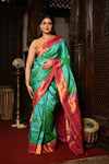 Mahalakshmi ~ Handloom Pure Silk Muniya Maharani Paithani with Maharani Pallu in Sea Green
