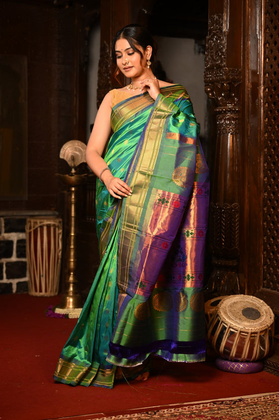 Mahalakshmi ~ Handloom Pure Silk Maharani Paithani with Maharani Pallu in Dual Tone Green Blue