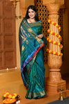 Gaurangi ~ Handloom Pure Silk Maharani Paithani with Majestic Maharani Pallu in Turquoise Blue