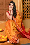 Gaurangi ~ Handloom Cotton Silk Saree with  Golden Border in Exclusive Dual Tone Yellow Red
