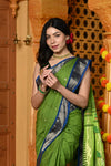 Gaurangi ~ Handloom Pure Cotton Paithani in Parrot Green and Blue with Pichwai Pallu