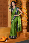 Gaurangi ~ Handloom Pure Cotton Paithani in Parrot Green and Blue with Pichwai Pallu