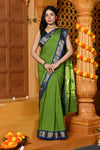 Gaurangi ~ Handloom Pure Cotton Paithani in Parrot Green and Blue with Pichwai Pallu
