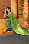 Gaurangi ~ Handloom Pure Cotton Paithani in Parrot Green and Blue with Pichwai Pallu