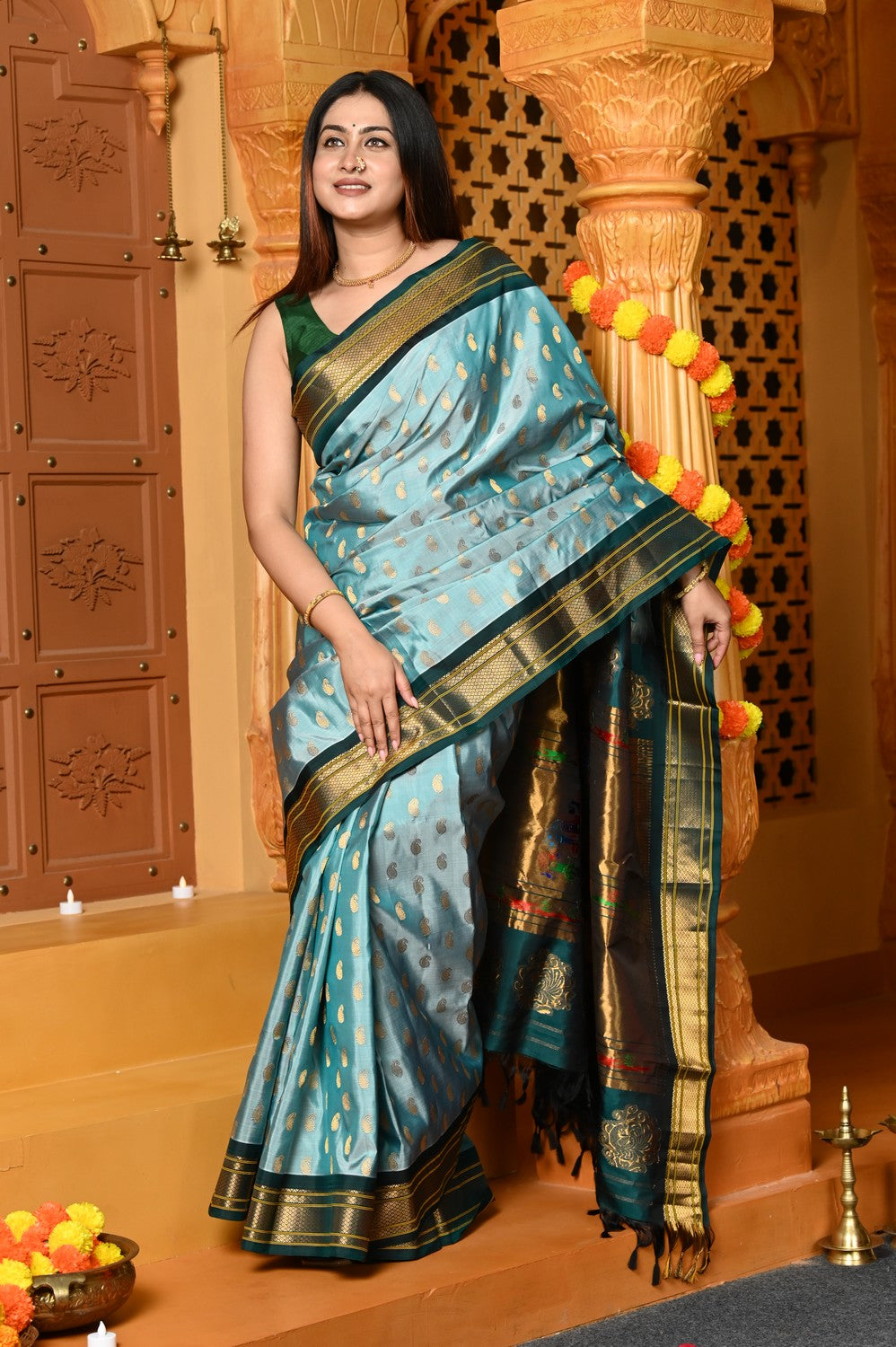 Gaurangi ~ Handloom Pure Silk Maharani Paithani with Majestic Maharani Pallu in Pista Green