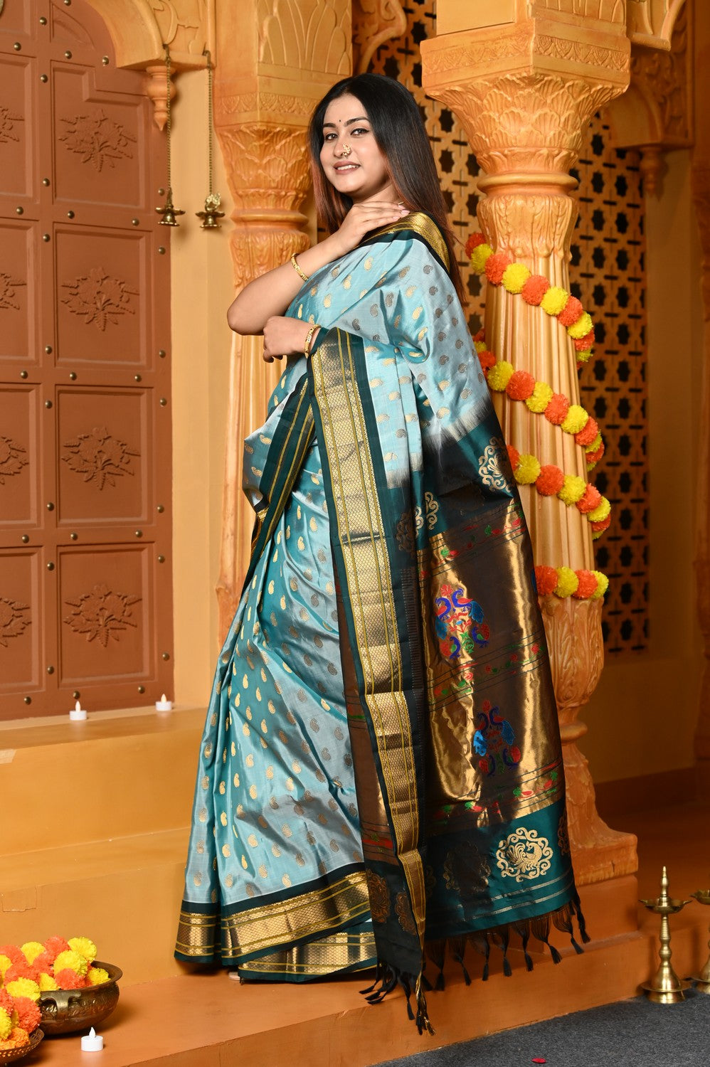 Gaurangi ~ Handloom Pure Silk Maharani Paithani with Majestic Maharani Pallu in Pista Green