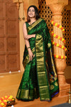 Gaurangi Chandrakor ~ Handloom Pure Silk Maharani Paithani with Majestic Maharani Pallu in Royal Green