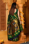 Gaurangi Chandrakor ~ Handloom Pure Silk Maharani Paithani with Majestic Maharani Pallu in Royal Green