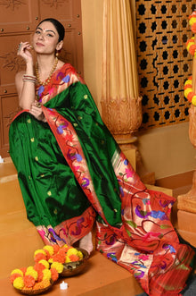  Gaurangi ~ Handloom Pure Silk Paithani Saree with Handcrafted Peacock Zari Border in Royal Green