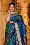 Gaurangi ~ Handloom Pure Silk Maharani Paithani with Majestic Maharani Pallu in Dual Tone Blue Green
