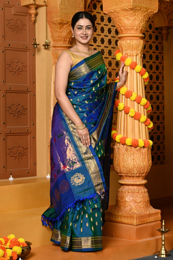 Gaurangi ~ Handloom Pure Silk Maharani Paithani with Majestic Maharani Pallu in Dual Tone Blue Green