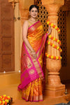 Virasat ~ Handloom Pure Silk Maharani Paithani with Maharani Pallu in Dual Tone Orange Pink with Pink Border