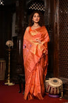 Virasat ~ Handloom Pure Silk Maharani Paithani with Maharani Pallu in Peach Orange with Muniya Butti