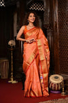 Virasat ~ Handloom Pure Silk Maharani Paithani with Maharani Pallu in Peach Orange with Muniya Butti