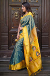 Virasat ~ Handloom Pure Silk Maharani Paithani with Maharani Pallu in Dual Tone Blue Green (Muniya Butti)