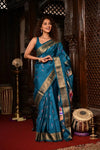 Rajsi ~ Handloom Pure Silk Maharani Paithani with Maharani Pallu in Peacock Blue (Muniya Butti)