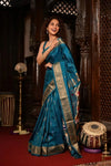 Rajsi ~ Handloom Pure Silk Maharani Paithani with Maharani Pallu in Peacock Blue (Muniya Butti)
