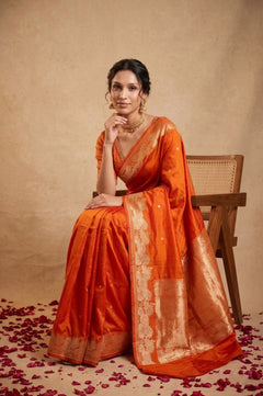 Ganga Ghat ~ Banarasi Handwoven Pure Soft Katan Silk Saree In Orange - verymuchindian.com