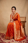 Ganga Ghat ~ Banarasi Handwoven Pure Soft Katan Silk Saree In Orange - verymuchindian.com