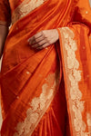 Ganga Ghat ~ Banarasi Handwoven Pure Soft Katan Silk Saree In Orange - verymuchindian.com