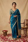 Ganga Ghat ~ Banarasi Pure Handloom Silk Saree with Elegant Silver Zari Buta and Borders In Peacock Blue - verymuchindian.com