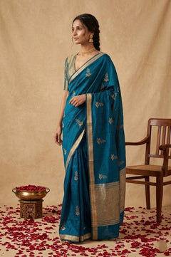 Ganga Ghat ~ Banarasi Pure Handloom Silk Saree with Elegant Silver Zari Buta and Borders In Peacock Blue - verymuchindian.com