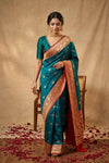 Ganga Ghat ~ Banarasi Pure Katan Silk Saree with Contrast Red Border and Elaborate Gold Zari Work In Teal Blue - verymuchindian.com