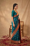 Ganga Ghat ~ Banarasi Pure Katan Silk Saree with Contrast Red Border In Teal Blue - verymuchindian.com