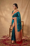 Ganga Ghat ~ Banarasi Pure Katan Silk Saree with Contrast Red Border In Teal Blue - verymuchindian.com