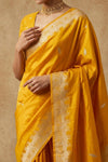 Ganga Ghat ~ Banarasi Pure Katan Silk Saree with Ornate Gold Zari Border and Floral Weave Detail In Mustard Yellow - verymuchindian.com