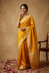 Ganga Ghat ~ Banarasi Pure Katan Silk Saree with Ornate Gold Zari Border and Floral Weave Detail In Mustard Yellow - verymuchindian.com