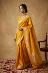 Ganga Ghat ~ Banarasi Pure Katan Silk Saree with Ornate Gold Zari Border and Floral Weave Detail In Mustard Yellow - verymuchindian.com