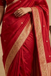 Ganga Ghat ~ Banarasi Pure Raw Mango Silk Saree with Traditional Gold Zari Border and Small Butti Work In Crimson Red - verymuchindian.com