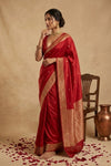 Ganga Ghat ~ Banarasi Pure Raw Mango Silk Saree with Traditional Gold Zari Border and Small Butti Work In Crimson Red - verymuchindian.com