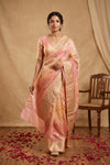 Ganga Ghat ~ Banarasi Pure Raw Silk Saree with Ornate Gold Zari Border and Floral Weave Detail In Dual - Tone Blush Pink and Peach - verymuchindian.com