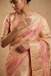 Ganga Ghat ~ Banarasi Pure Raw Silk Saree with Ornate Gold Zari Border and Floral Weave Detail In Dual - Tone Blush Pink and Peach - verymuchindian.com