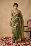Ganga Ghat ~ Banarasi Pure Tissue Silk Saree In Olive Green With with Rich Lachha Border - verymuchindian.com